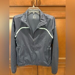 Nike woman’s Dark Blue Windbreaker / Nike Shield